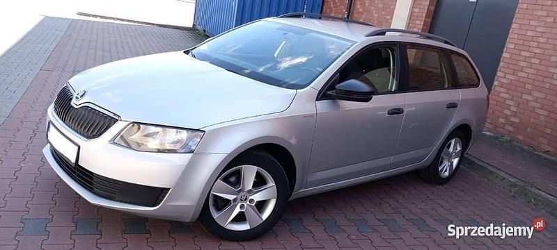 Srebrny Używany 2014 Skoda Octavia Kombi | 33 899 zł (Dość drogi) - Obraz 1/4