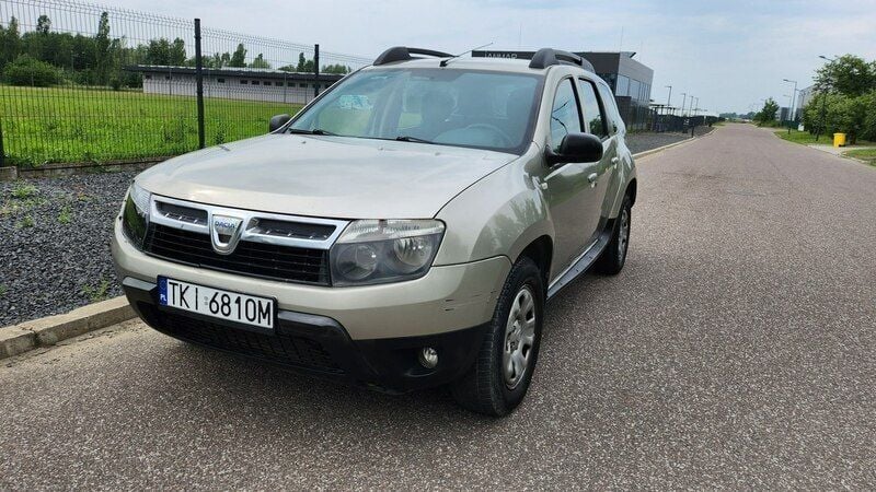 Beżowy (metalik) Używany 2011 Dacia Duster SUV | 14 900 zł - Obraz 1/4
