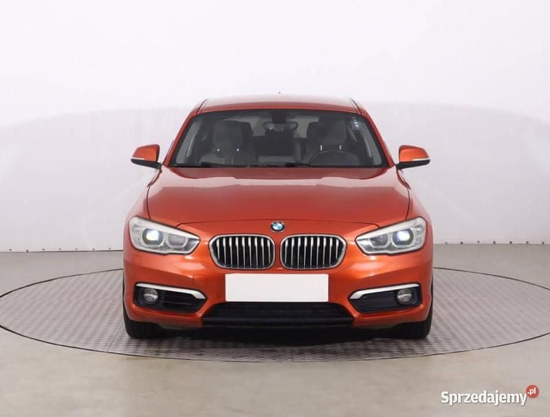 Pomarańczowy Używany 2016 BMW 118 Hatchback | 55 999 zł (Uczciwa cena) - Obraz 1/4