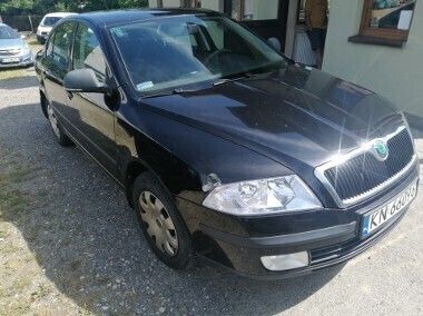 Czarny Używany 2011 Skoda Octavia | 11 500 zł (Dobra cena) - Obraz 1/4