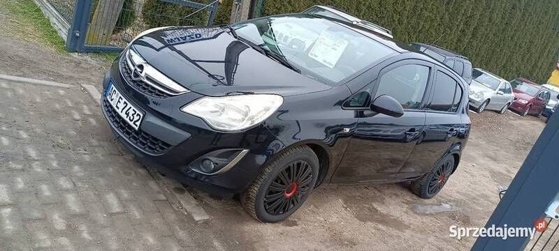 Czarny Używany 2011 Opel Corsa Hatchback | 13 555 zł (Dobra cena) - Obraz 1/4