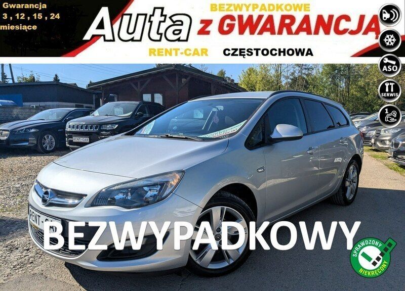 Szary Używany 2013 Opel Astra Kombi | 25 900 zł (Uczciwa cena) - Obraz 1/4