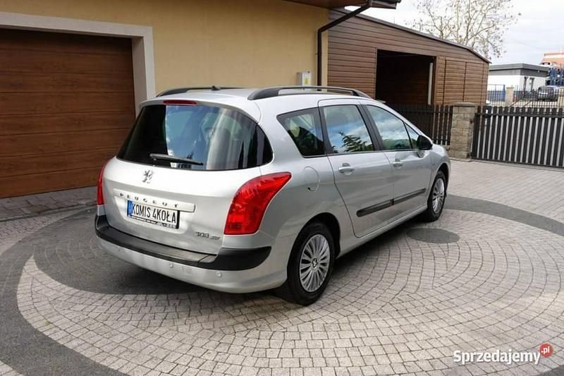 Używany Peugeot 308 SW 120 KM (88 kW) 2008 Srebrny (metalik) Kombi