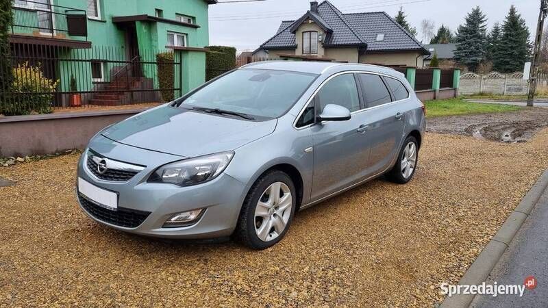 Szary Używany 2011 Opel Astra Kombi | 18 400 zł (Uczciwa cena) - Obraz 1/4