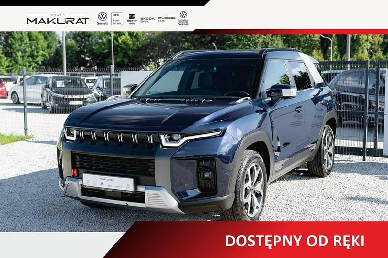 Granatowy Używany 2023 Ssangyong (KGM) Torres SUV | 99 900 zł (Dobra cena) - Obraz 1/4