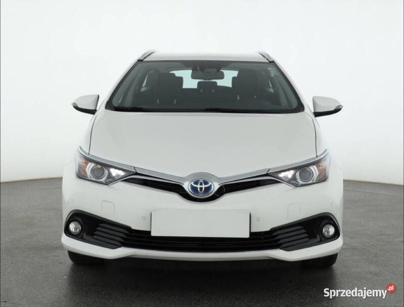 Biały Używany 2018 Toyota Auris Hybrid Kombi | 67 999 zł (Uczciwa cena) - Obraz 1/4