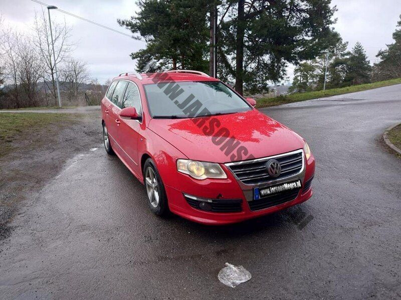 Czerwony Używany 2009 VW Passat Kombi | 14 200 zł (Uczciwa cena) - Obraz 1/4