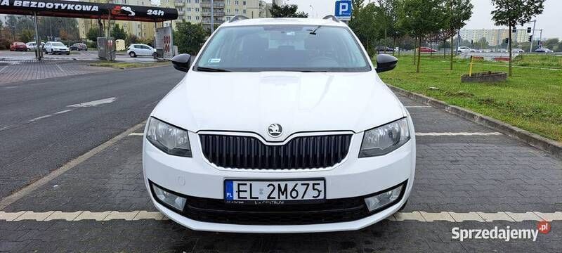Biały Używany 2014 Skoda Octavia Kombi | 23 999 zł (Uczciwa cena) - Obraz 1/4