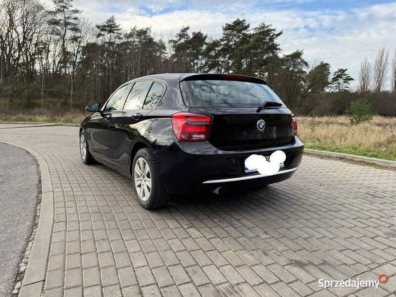 Czarny Używany 2012 BMW 118 Urban Line Hatchback | 24 950 zł (Uczciwa cena) - Obraz 1/4