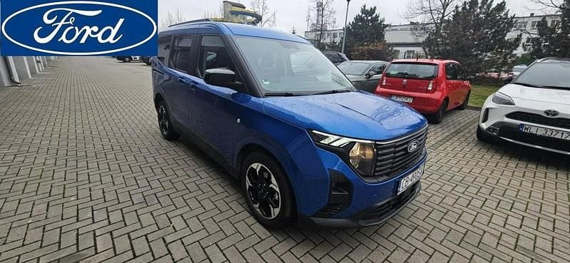 Niebieski jasny (metalik, perła) Używany 2024 Ford Tourneo Courier Minivan | 82 500 zł (Uczciwa cena) - Obraz 1/4
