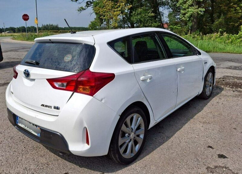 Biały Używany 2013 Toyota Auris Hybrid Hatchback | 16 999 zł - Obraz 1/4