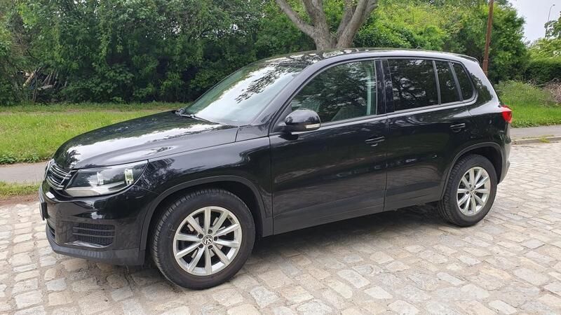 Czarny metalik Używany 2014 VW Tiguan SUV | 41 700 zł (Super Cena) - Obraz 1/4