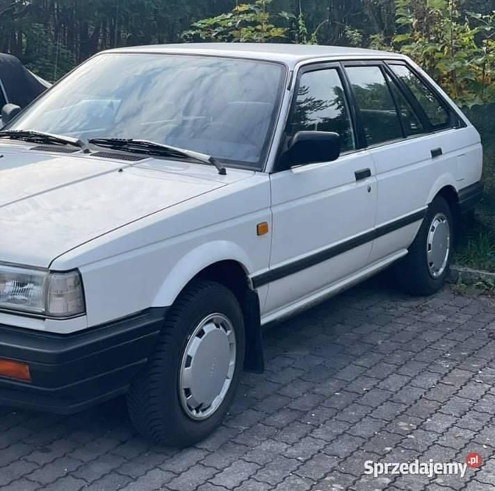 Biały Używany 1987 Nissan Sunny Kombi | 11 000 zł - Obraz 1/4