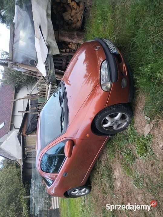 Pomarańczowy Używany 1996 Opel Tigra Hatchback | 3500 zł - Obraz 1/4