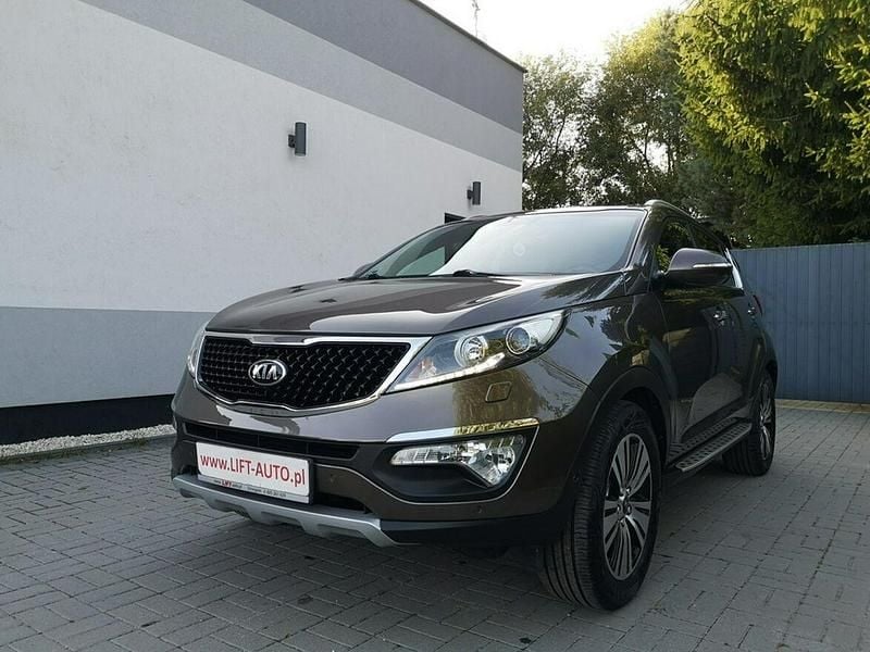 Brązowy (metalik) Używany 2015 Kia Sportage 2 SUV | 49 900 zł (Uczciwa cena) - Obraz 1/4