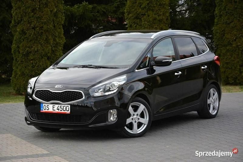 Czarny Używany 2015 Kia Carens 2 Minivan | 35 900 zł (Uczciwa cena) - Obraz 1/4