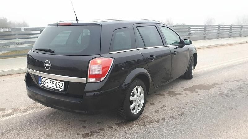 Czarny Używany 2009 Opel Astra Kombi | 14 999 zł (Dość drogi) - Obraz 1/4
