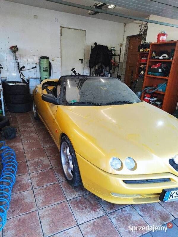 Żółty Używany 1998 Alfa Romeo Spider Kabriolet | 10 000 zł - Obraz 1/3