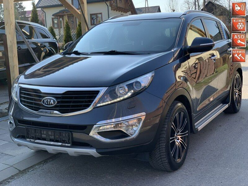 Grafitowy (metalik) Używany 2012 Kia Sportage 2 SUV | 43 700 zł (Uczciwa cena) - Obraz 1/4