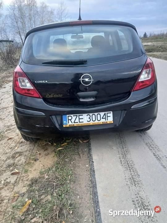 Czarny Używany 2009 Opel Corsa Hatchback | 9900 zł (Uczciwa cena) - Obraz 1/3