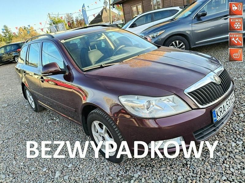 Czerwony Używany 2010 Skoda Octavia Kombi | 11 900 zł (Uczciwa cena) - Obraz 1/4
