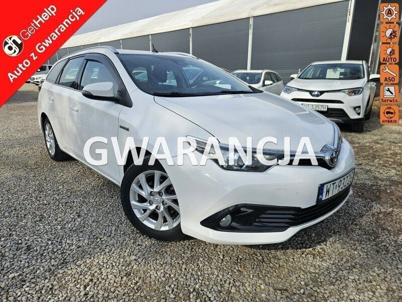 Biały Używany 2017 Toyota Auris Hybrid Kombi | 42 900 zł (Uczciwa cena) - Obraz 1/4