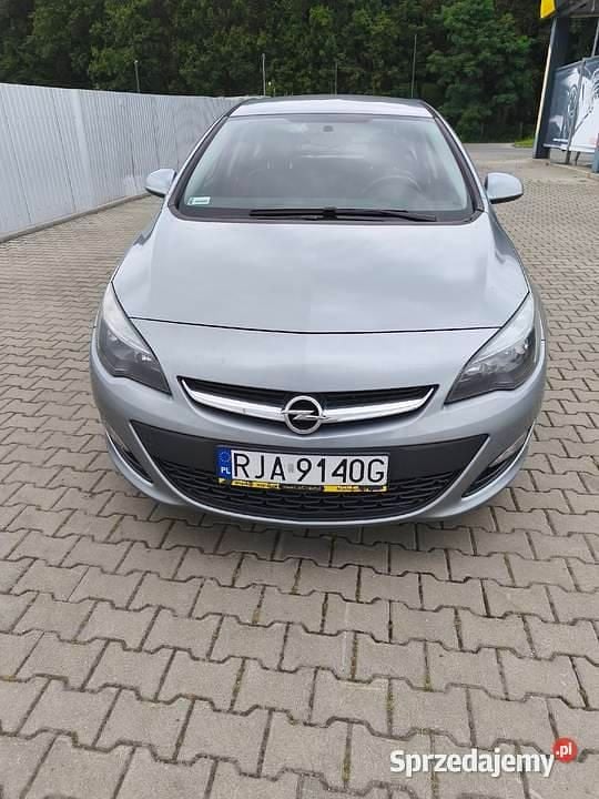 Szary Używany 2015 Opel Astra Sedan/Limuzyna | 28 900 zł (Dobra cena) - Obraz 1/4