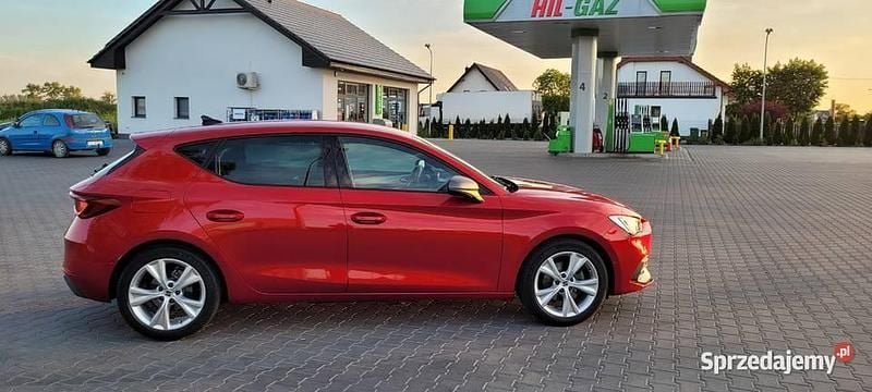 Czerwony Używany 2021 Seat Leon Hatchback | 82 999 zł (Drogi) - Obraz 1/4