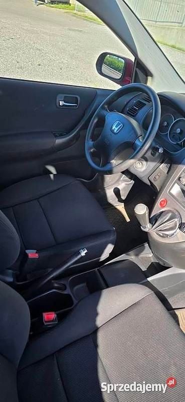 Używany Honda Civic 90 KM (66 kW) 2004 Czerwony Hatchback