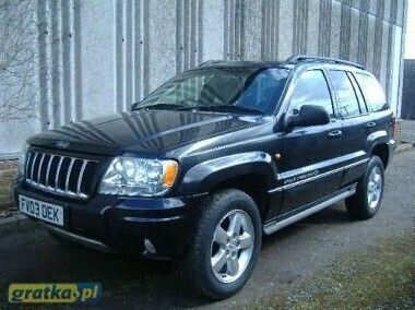 Czarny Używany 2002 Jeep Grand Cherokee SUV | 9900 zł - Obraz 1/4