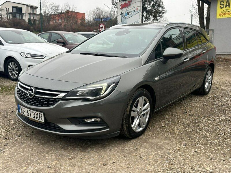 Szary (metalik) Używany 2019 Opel Astra Kombi | 45 900 zł (Uczciwa cena) - Obraz 1/4