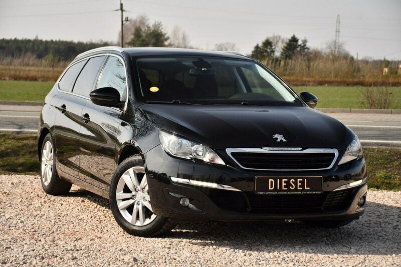 Używany Peugeot 308 120 KM (88 kW) 2014 Niebieski ciemny (metalik, perła) Hatchback