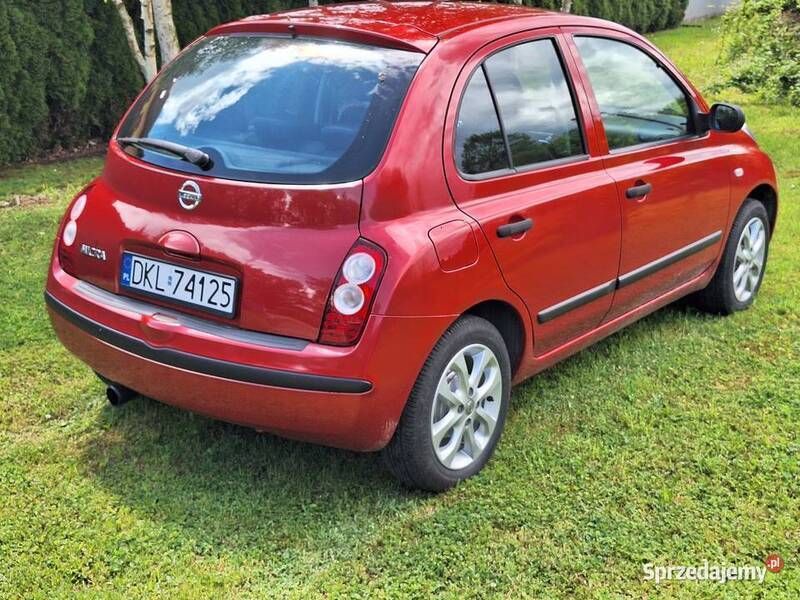 Czerwony Używany 2006 Nissan Micra Hatchback | 8299 zł (Dość drogi) - Obraz 1/4