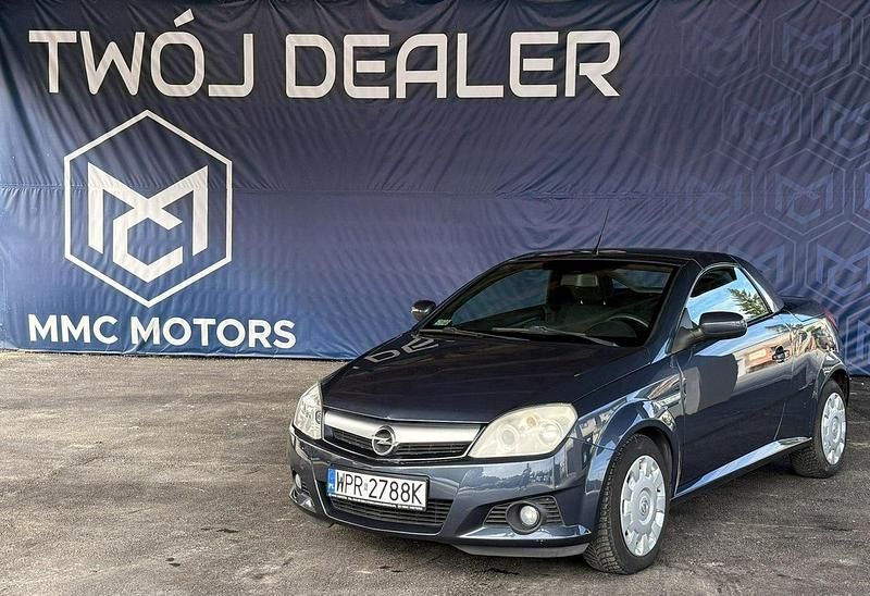 Szary (metalik) Używany 2007 Opel Tigra Kabriolet | 12 800 zł (Uczciwa cena) - Obraz 1/4