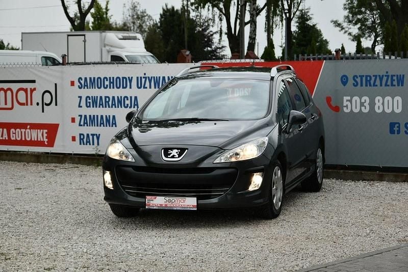 Używany Peugeot 308 SW 90 KM (66 kW) 2010 Szary (metalik, perła) Kombi