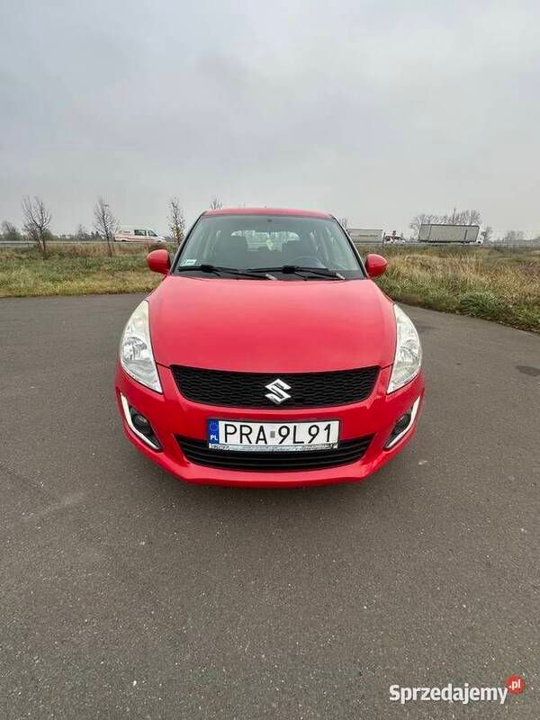 Czerwony Używany 2014 Suzuki Swift Hatchback | 21 800 zł - Obraz 1/4