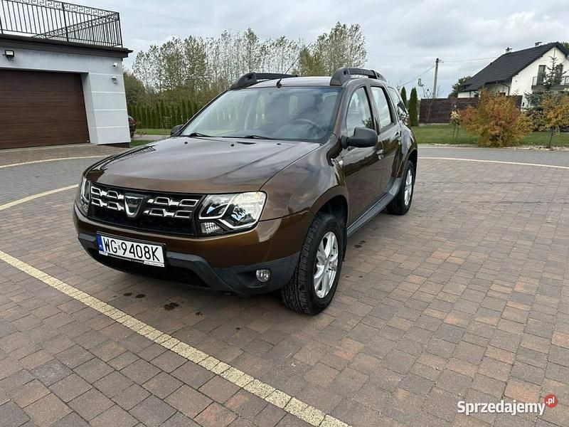 Używany Dacia Duster 125 KM (91 kW) 2015 Brązowobeżowy SUV