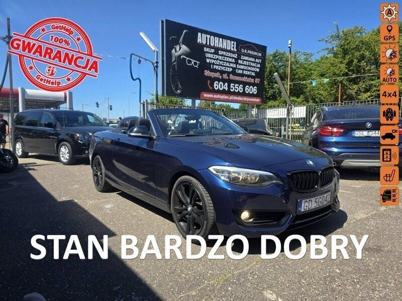 Niebieski Używany 2014 BMW 230 Kabriolet | 65 990 zł - Obraz 1/4