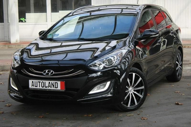 Czarny (metalik) Używany 2014 Hyundai i30 Premium Kombi | 36 666 zł - Obraz 1/4