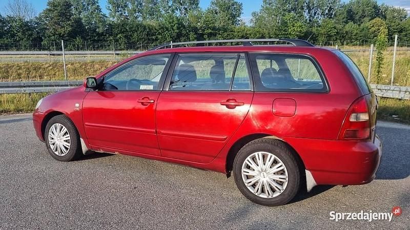 Czerwony Używany 2003 Toyota Corolla Kombi | 3400 zł (Uczciwa cena) - Obraz 1/4