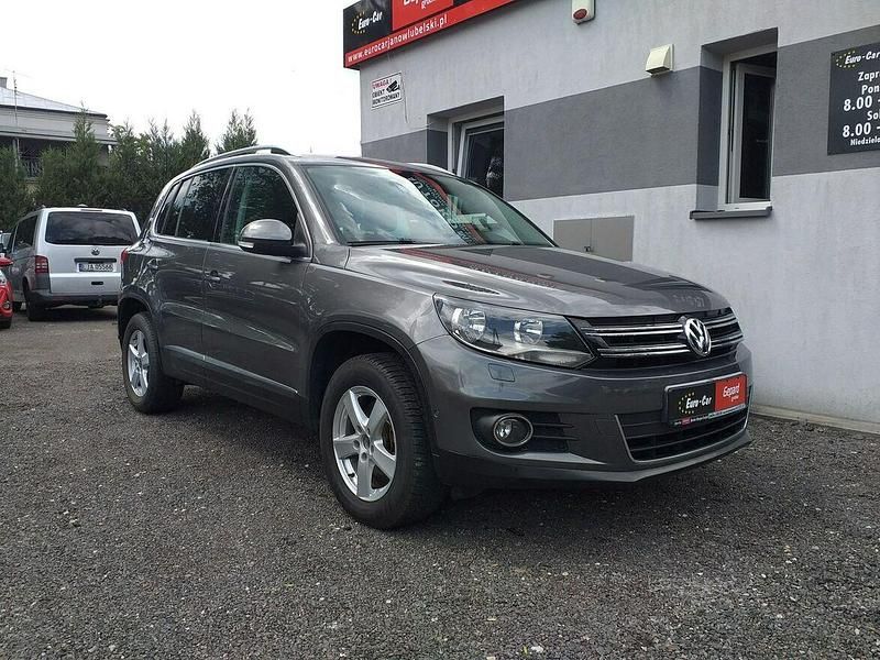 Szary (metalik) Używany 2012 VW Tiguan SUV | 43 900 zł (Uczciwa cena) - Obraz 1/4