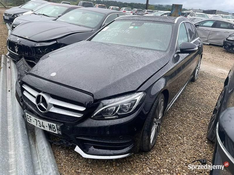 Czarny Używany 2016 Mercedes C250 Kombi | 41 600 zł - Obraz 1/4