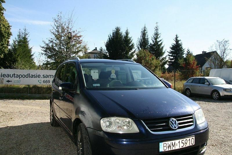 Niebieski ciemny (metalik) Używany 2005 VW Touran Minivan | 4699 zł (Super Cena) - Obraz 1/4