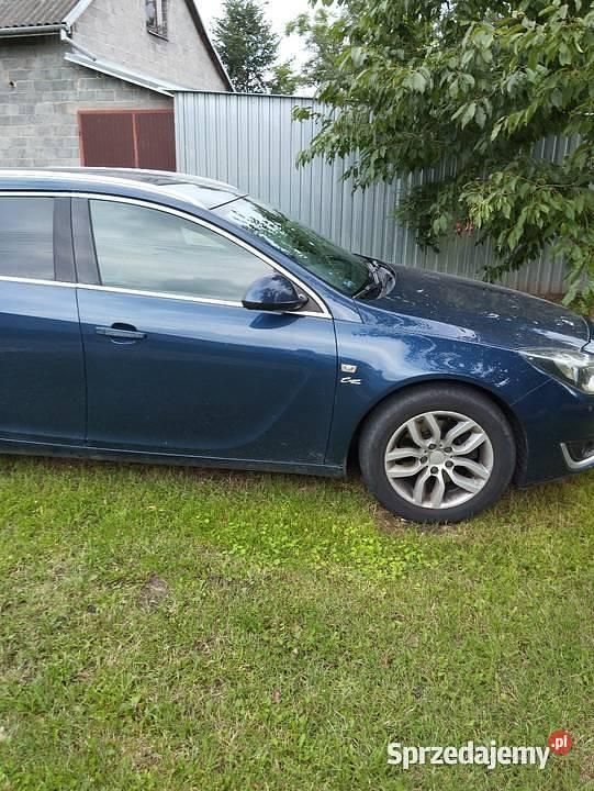 Granatowy Używany 2014 Opel Insignia Kombi | 29 000 zł (Uczciwa cena) - Obraz 1/4