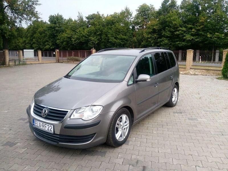 Używany VW Touran 105 KM (77 kW) 2007 Żółtozłoty Minivan