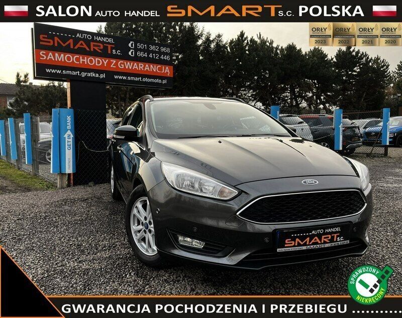 Szary Używany 2018 Ford Focus Sedan/Limuzyna | 41 900 zł (Uczciwa cena) - Obraz 1/4