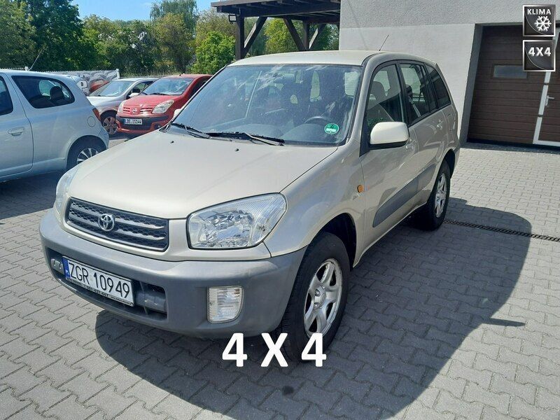 Złoty Używany 2003 Toyota RAV4 SUV | 22 900 zł (Uczciwa cena) - Obraz 1/4