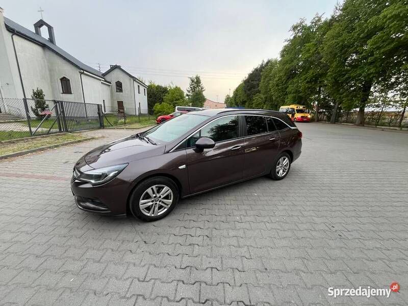 Brązowy Używany 2016 Opel Astra Kombi | 34 500 zł (Drogi) - Obraz 1/4