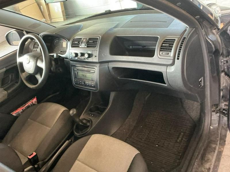 Używany Skoda Fabia 85 KM (62 kW) 2010 Czarny Hatchback