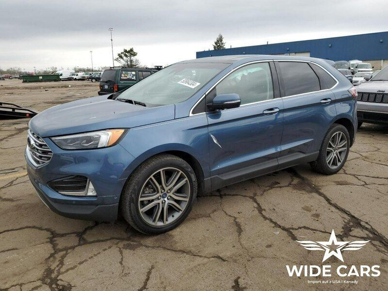 Niebieski ciemny (metalik) Używany 2019 Ford Edge Titanium SUV | 50 900 zł - Obraz 1/4